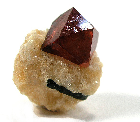 A zircon crystal. Photo courtesy  of Robert Lavinsky, iRocks.com