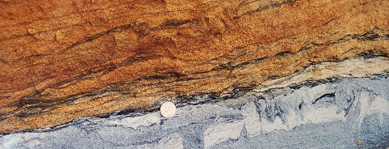 Heavy mineral laminae observed in Neogene sands from the former Old Hickory Mine near Stony Creek, VA (photo courtesy of Rick Berquist, Virginia Geology and Mineral Resources Program)
