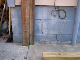 Crack in a building foundation caused by expansive soils in the Richmond area